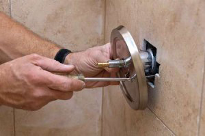 Peoria plumbing associate replaces faulty shower control
